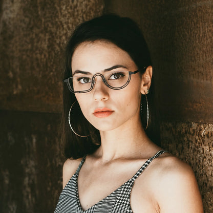 Model wearing Barledear Graphite Mosaic Black eyeglasses in a lifestyle portrait