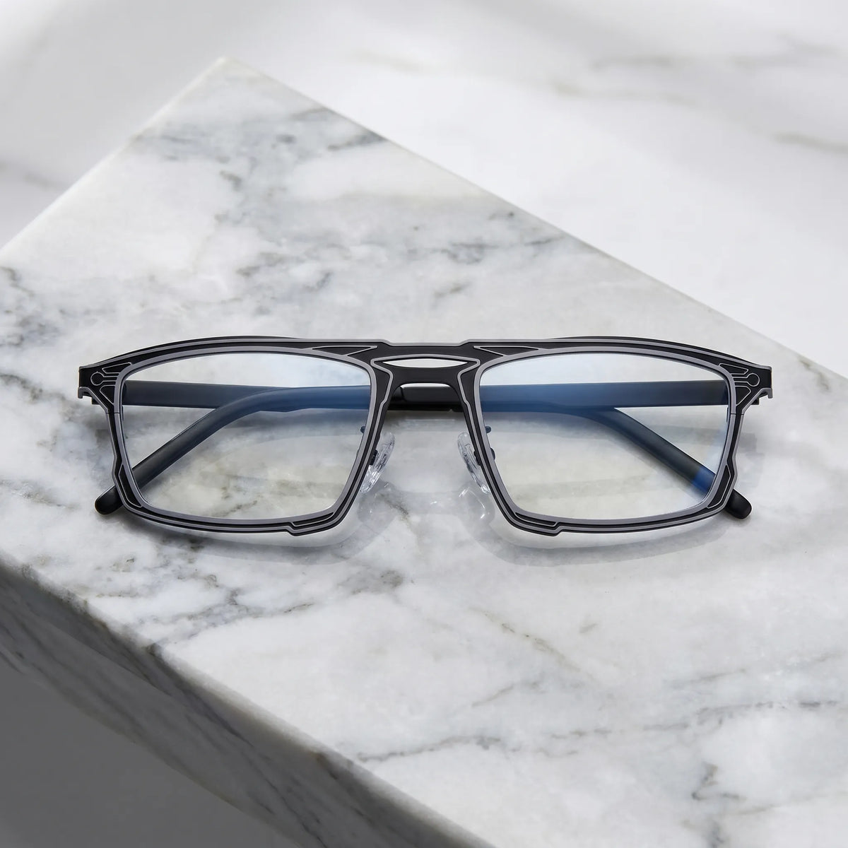 Barledear Graphite Noir eyeglasses folded display showing slim titanium frame and temple design
