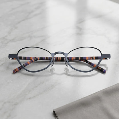 Barledear Graphite Tortoise eyeglasses folded display showing tortoise-patterned temples and slim titanium frame