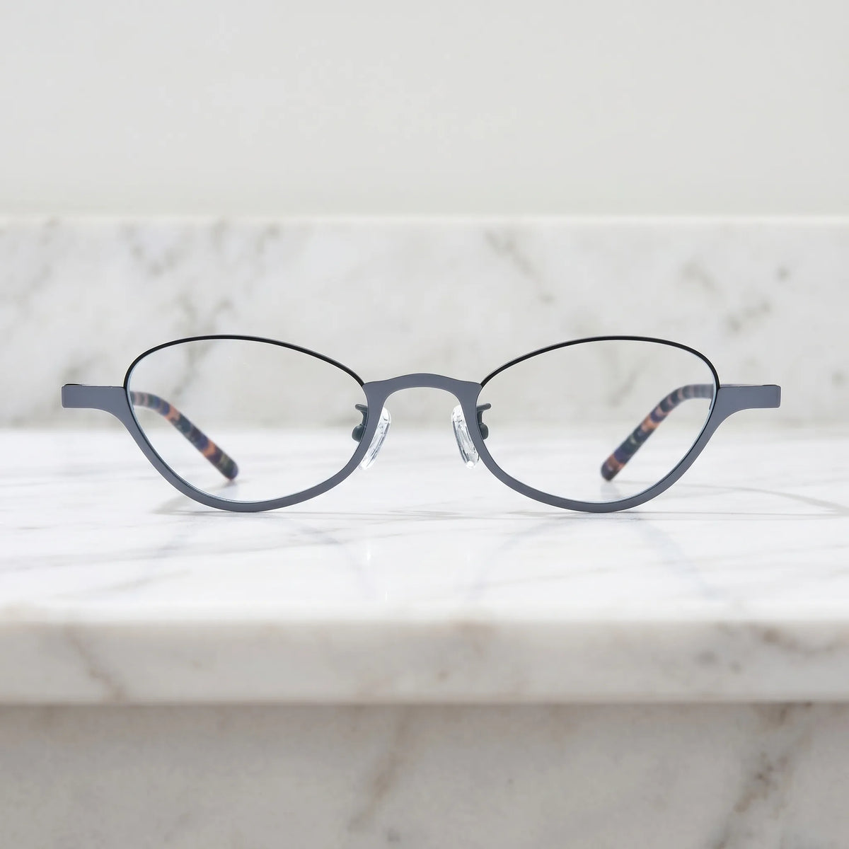 Barledear Graphite Tortoise eyeglasses shown in a clean lifestyle front view with modern gray oval frame