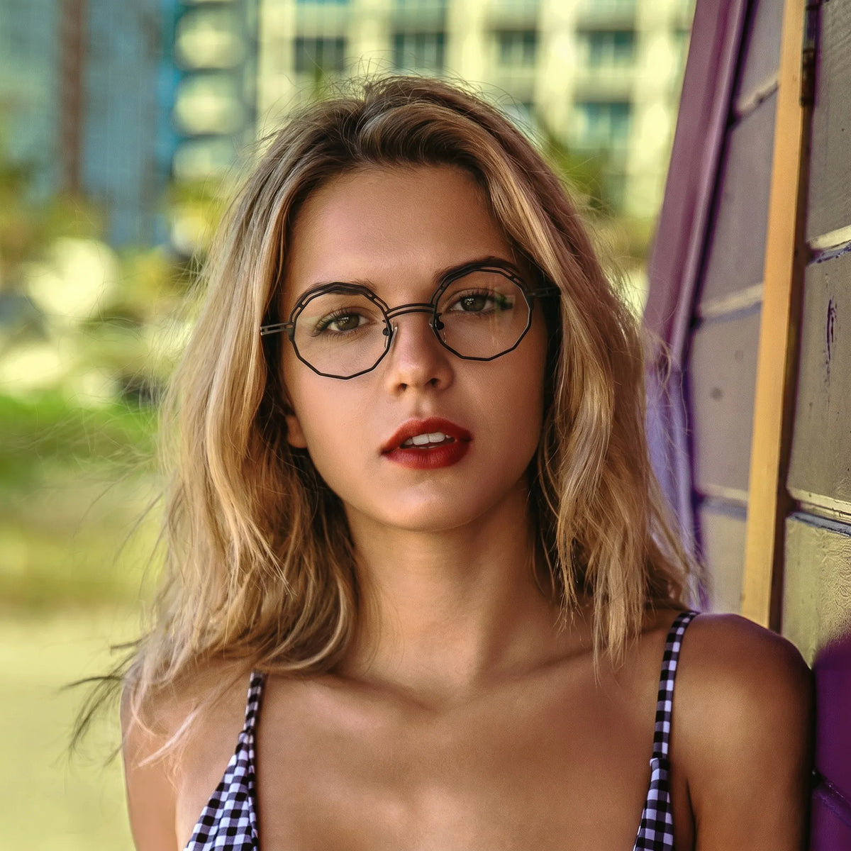Model wearing Barledear Ink Noir eyeglasses in a lifestyle portrait