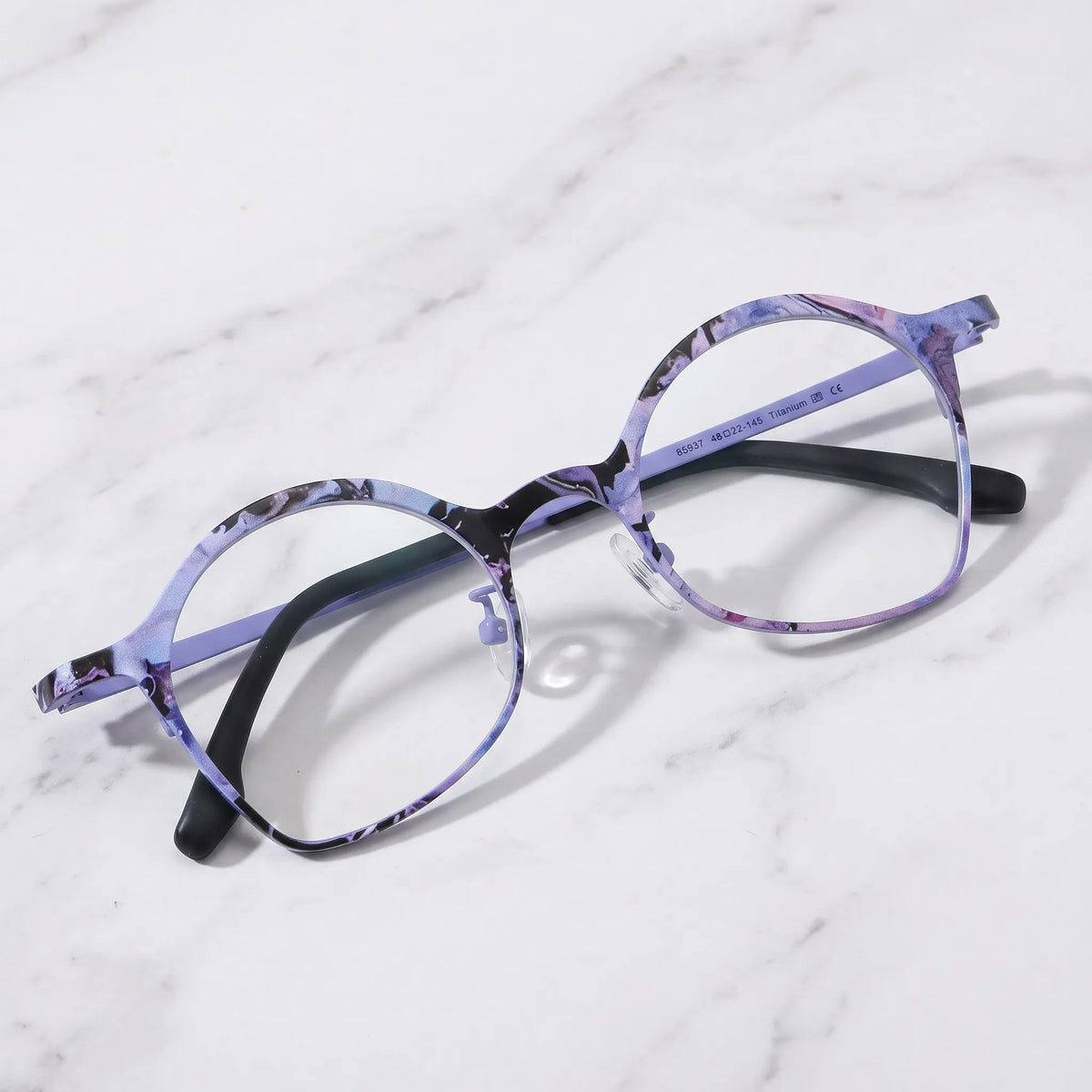 Barledear Lavender Ink Purple eyeglasses folded display showing patterned titanium frame and slim temples