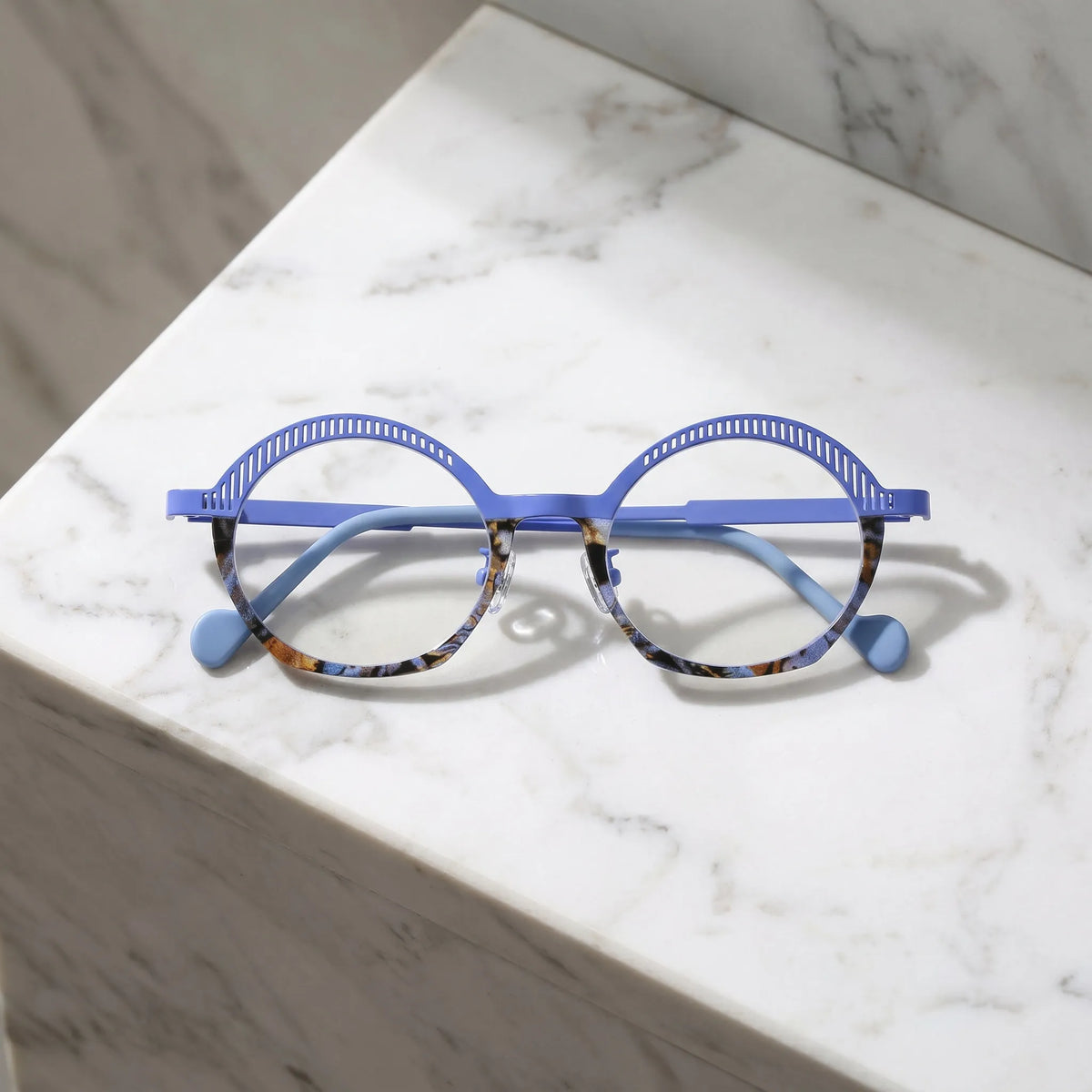 Barledear Lavender Mosaic eyeglasses folded display showing slim titanium temples, clear nose pads, and artistic oval frame design