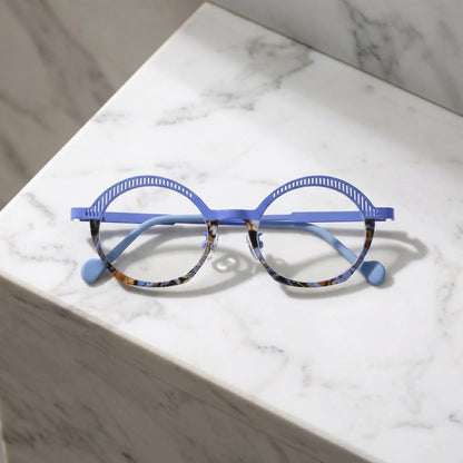 Barledear Lavender Mosaic eyeglasses folded display showing slim titanium temples, clear nose pads, and artistic oval frame design