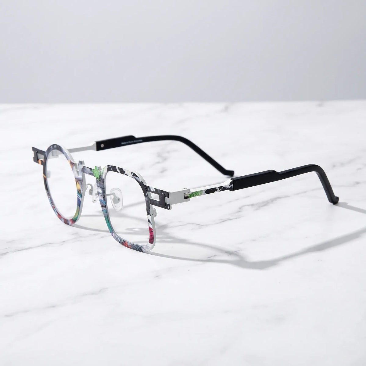 Barledear Marble White eyeglasses angled side view showing slim temples, extended side-bar detail, and adjustable nose pads