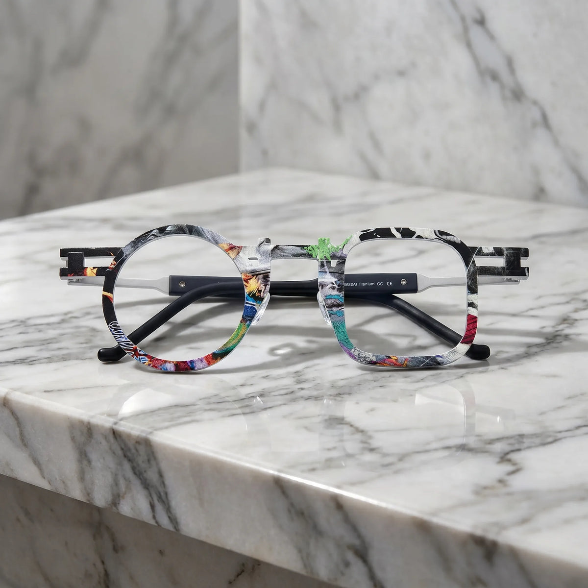 Barledear Marble White eyeglasses folded display showing printed titanium temples and full-rim frame structure