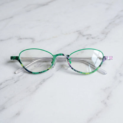 Barledear Meadow Jade eyeglasses folded display showing green titanium front and clear patterned temple arms