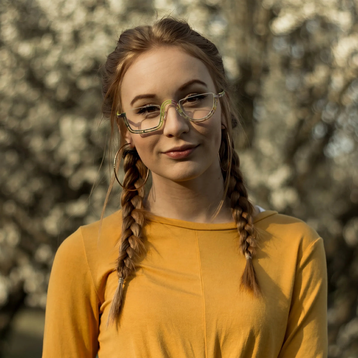 Model wearing Barledear Meadow Lime Yellow eyeglasses in a lifestyle portrait