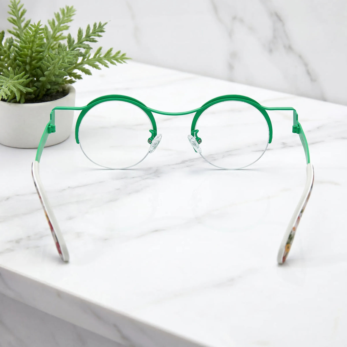 Barledear Meadow Splash eyeglasses back view showing adjustable nose pads, slim temples, and lightweight pure titanium construction