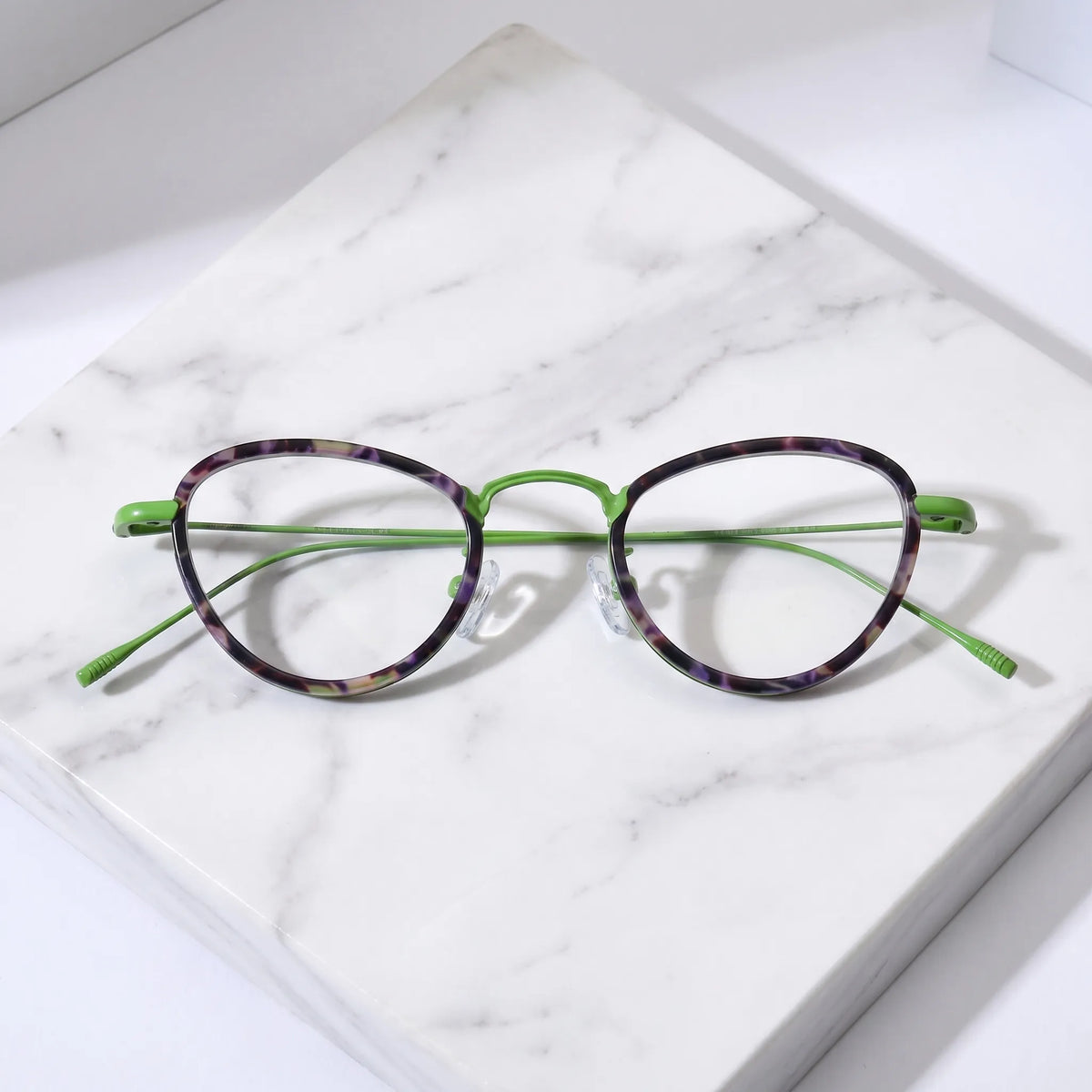 Barledear Meadow Violet eyeglasses folded display showing patterned acetate front and slim green titanium temples