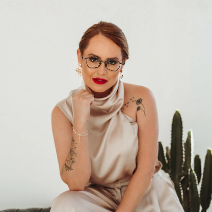 Model wearing Barledear Midnight Marble Black eyeglasses in a lifestyle portrait