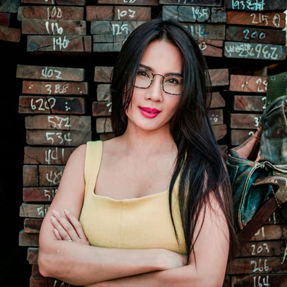 Model wearing Barledear Midnight Tortoise Black eyeglasses in a lifestyle portrait
