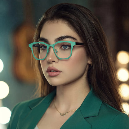 Model wearing Barledear Mint Graphite eyeglasses with modern square titanium frame in a lifestyle portrait