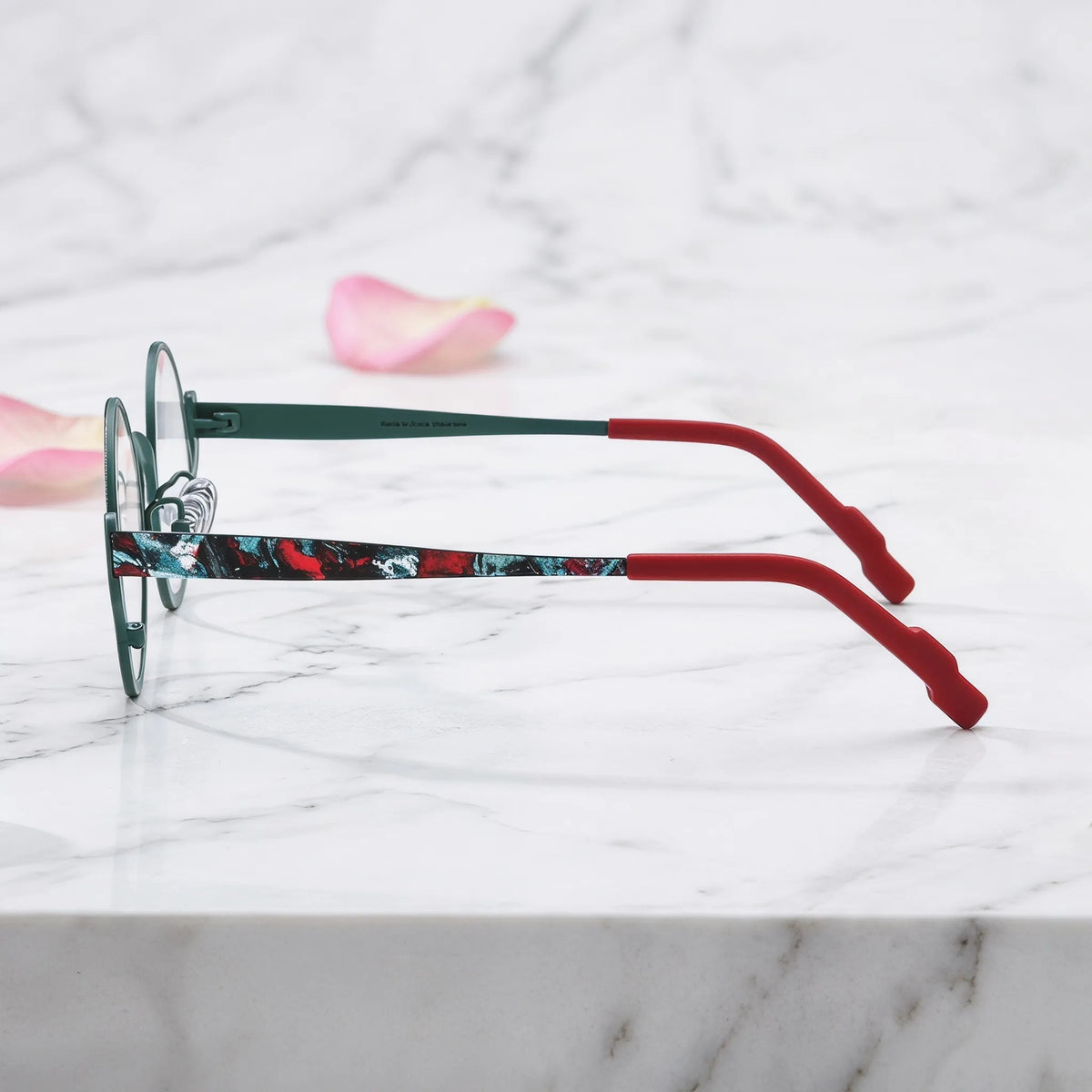 Barledear Mosaic Jade eyeglasses angled side view showing slim temples, adjustable nose pads, and a lightweight round full-rim titanium frame