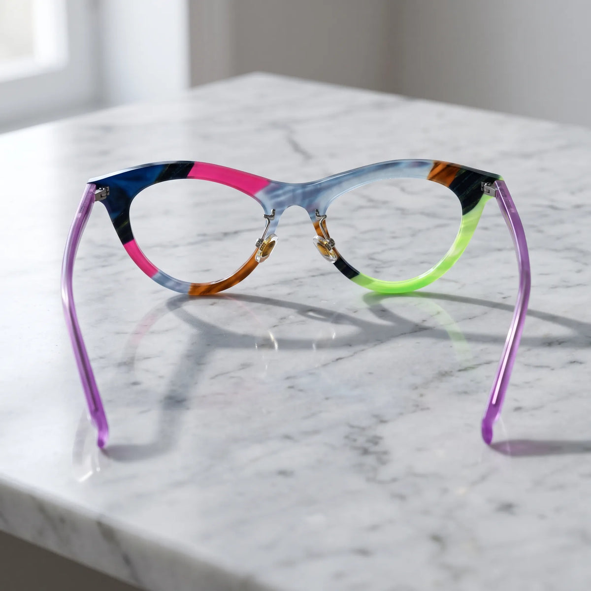 Barledear Neon Smoke Mosaic cat-eye eyeglasses back view showing the adjustable nose pads, full-rim frame, and purple temples
