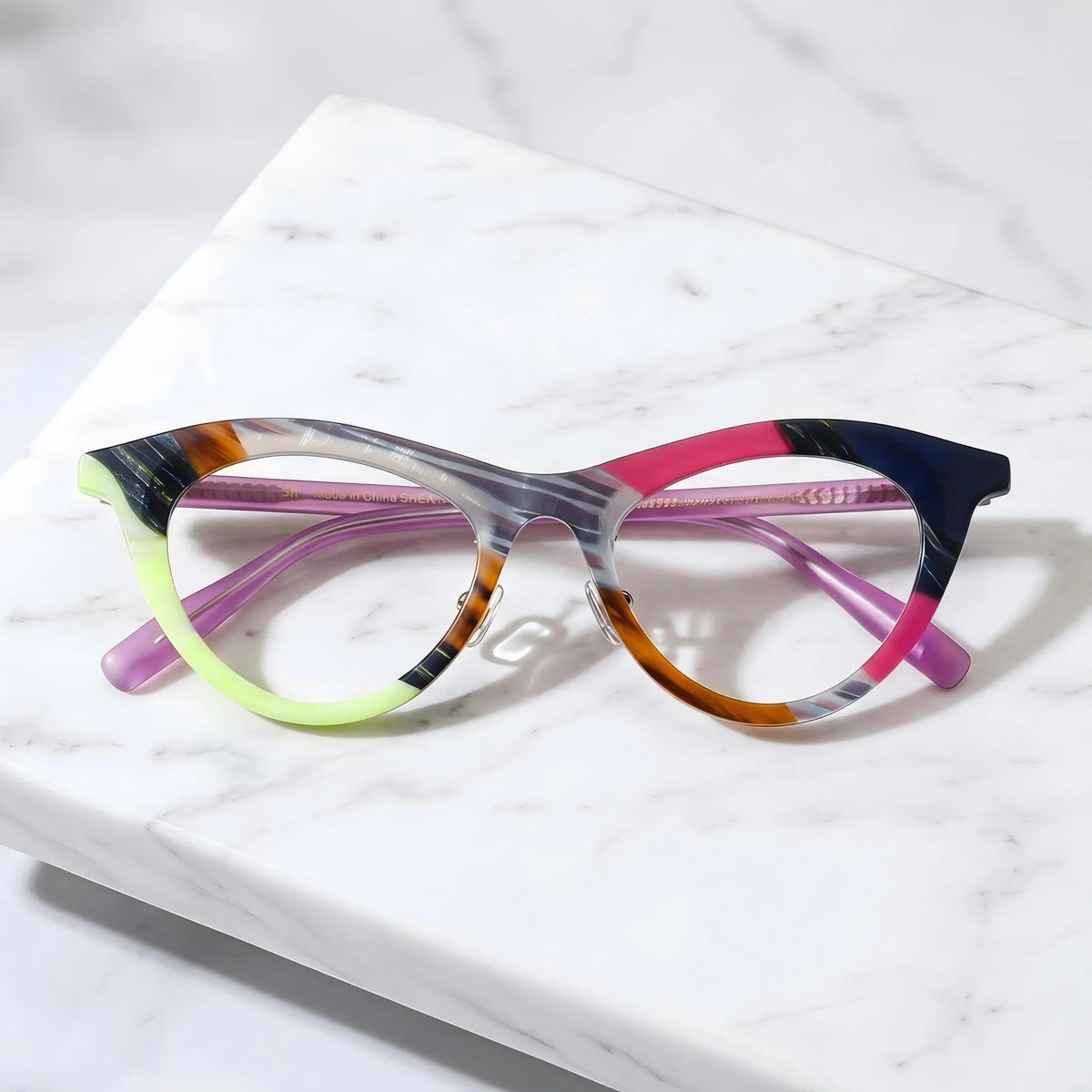 Barledear Neon Smoke Mosaic cat-eye eyeglasses folded display showing the patchwork acetate front and translucent purple temples