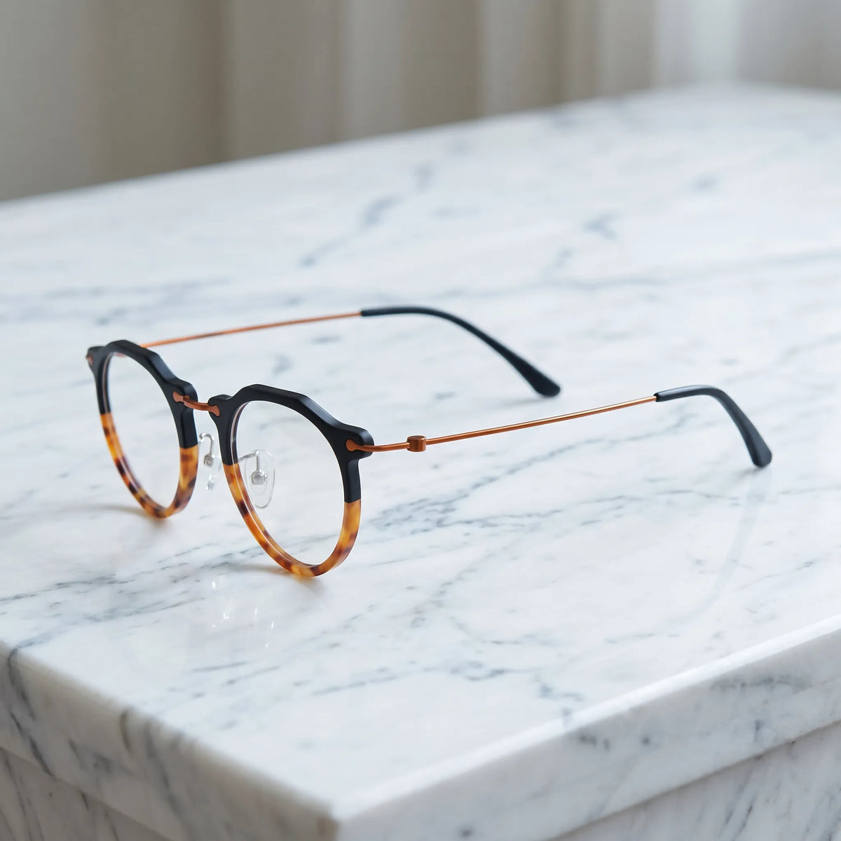 Barledear Noir Amber eyeglasses angled side view showing slim wire temples adjustable nose pads and bridge detail