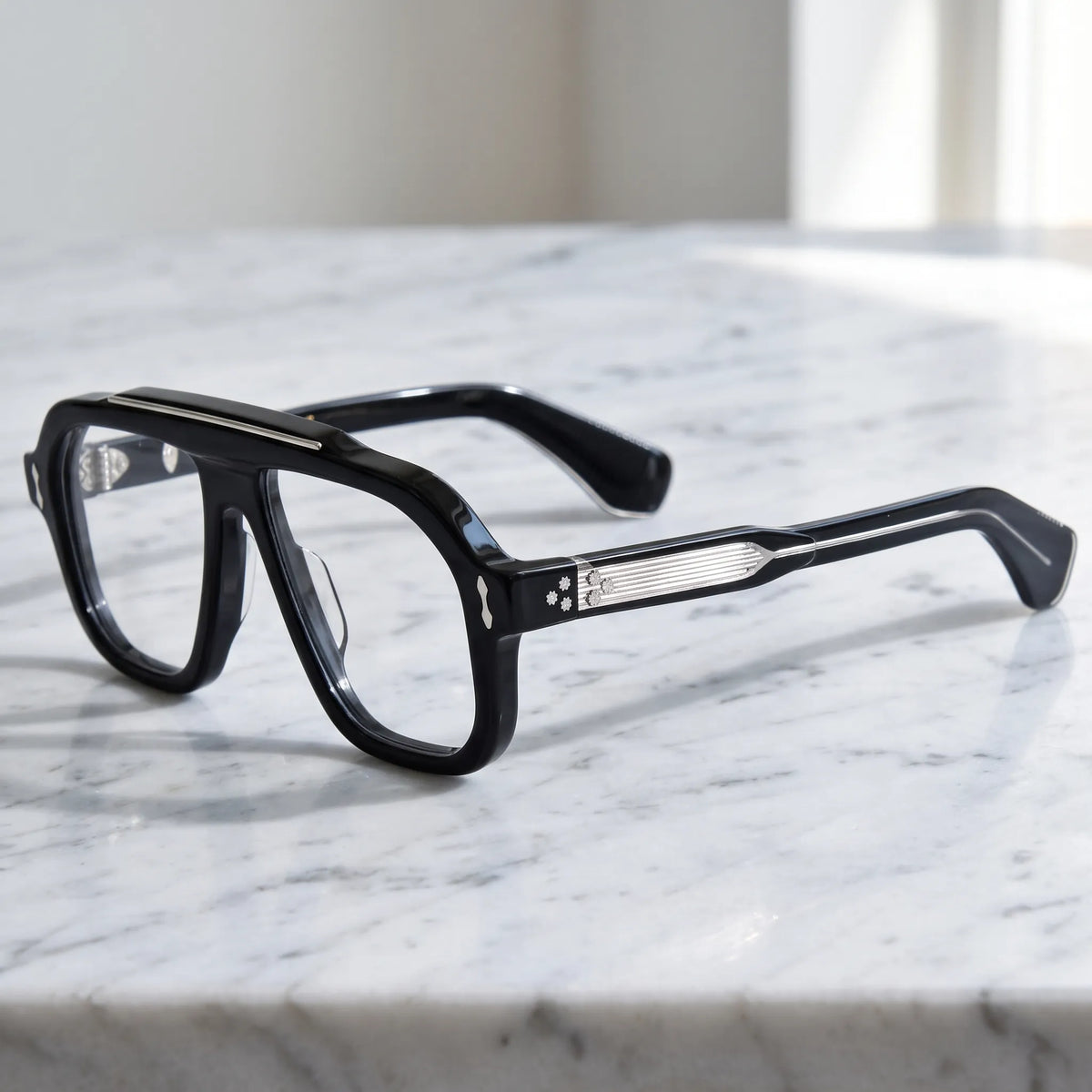 Barledear Obsidian Black eyeglasses angled side view showing polished black temples, silver-tone linear inlays and metal screw hinges