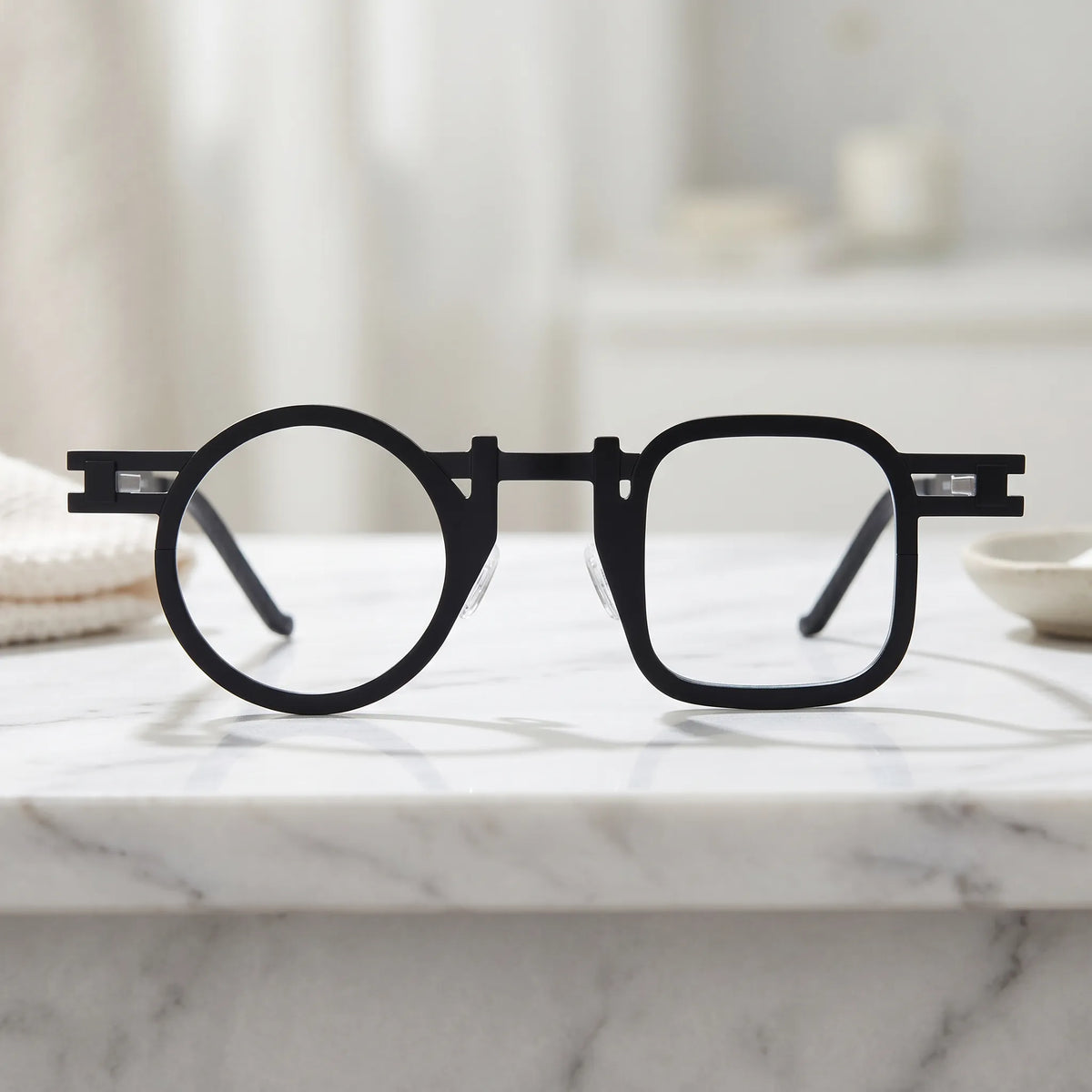 Barledear Obsidian Black eyeglasses shown in a clean lifestyle front view with matte geometric frame detail