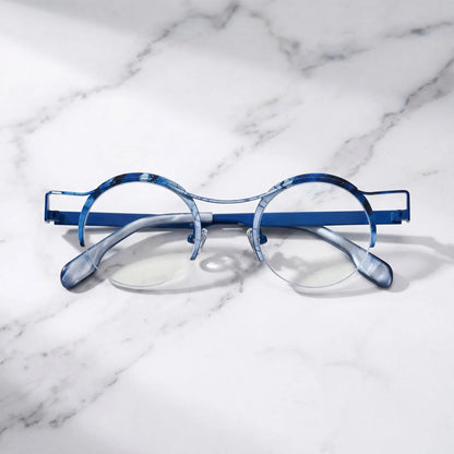 Barledear Ocean Marble eyeglasses folded display showing slim titanium temples and blue marble color-spliced design