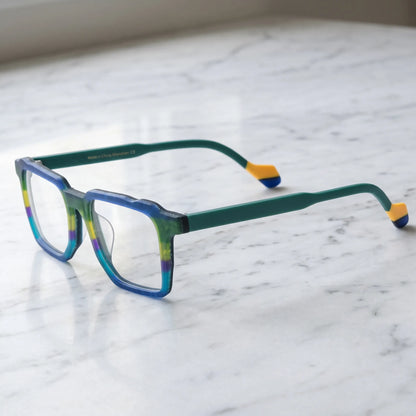 Barledear Ocean Meadow eyeglasses angled side view showing solid green temples and yellow blue temple tips