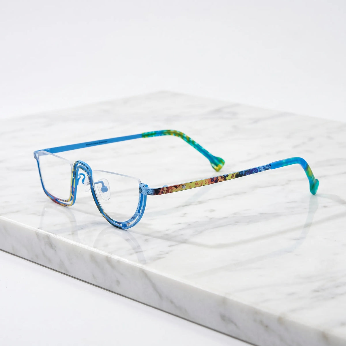 Barledear Ocean Mosaic Blue eyeglasses angled side view showing patterned titanium temples and bridge detail