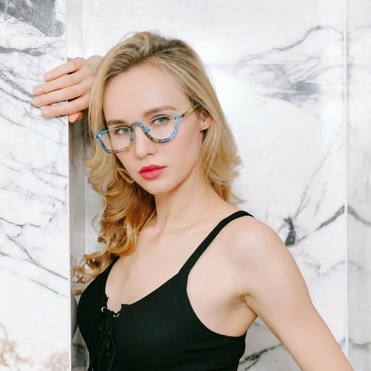 Model wearing Barledear Ocean Mosaic Blue eyeglasses in a lifestyle portrait