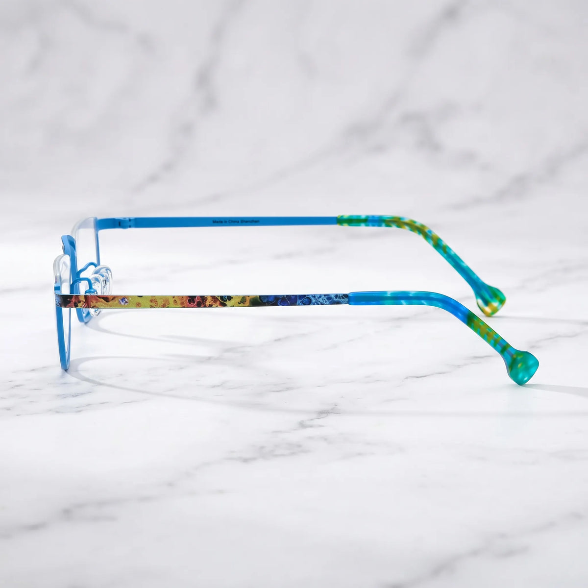 Barledear Ocean Mosaic Blue eyeglasses angled side view showing patterned titanium temples and bridge detail