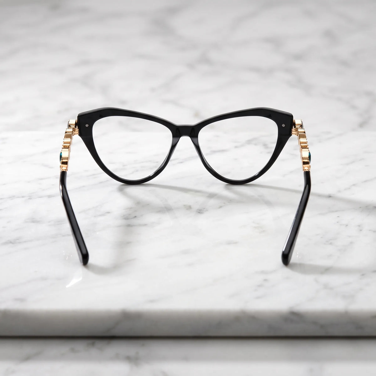 Barledear Onyx Black eyeglasses back view showing the full-rim cat-eye structure, molded nose pads, and smooth black acetate temple tips