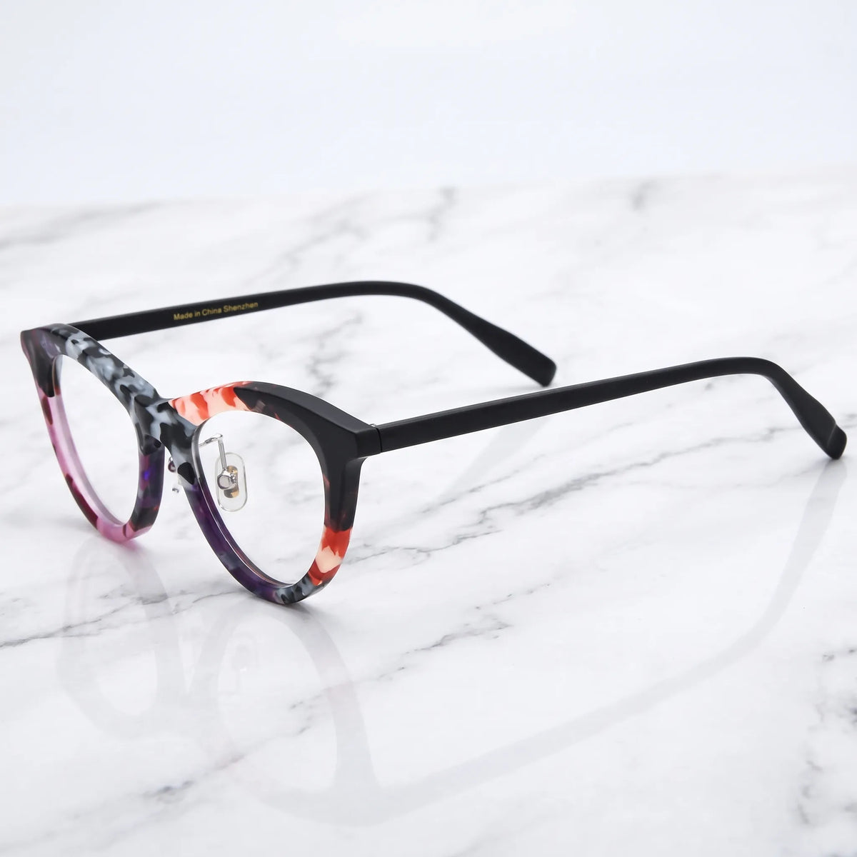Barledear Plum Ember Mosaic cat-eye acetate eyeglasses angled side view showing the patterned frame front and slim black temples