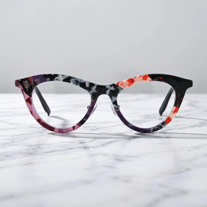 Barledear Plum Ember Mosaic cat-eye acetate eyeglasses shown in a clean lifestyle front view with artistic marbled colors