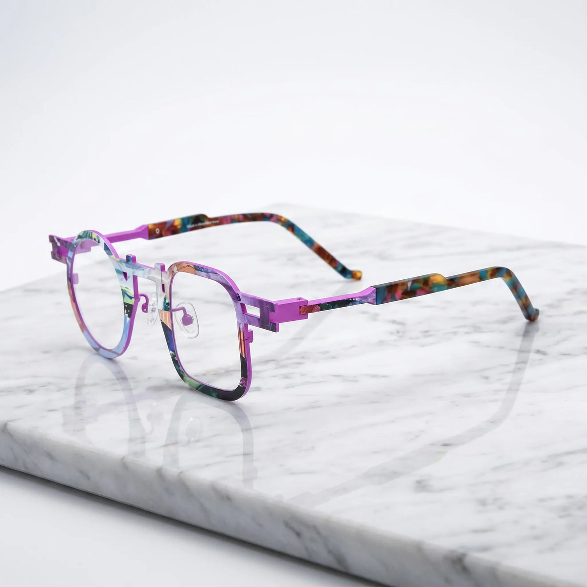 Barledear Prism Violet eyeglasses angled side view showing slim temples, extended side-bar detail, and adjustable nose pads