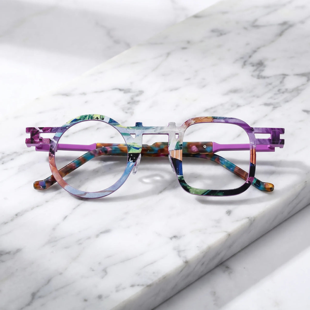 Barledear Prism Violet eyeglasses folded display showing printed titanium temples and full-rim frame structure