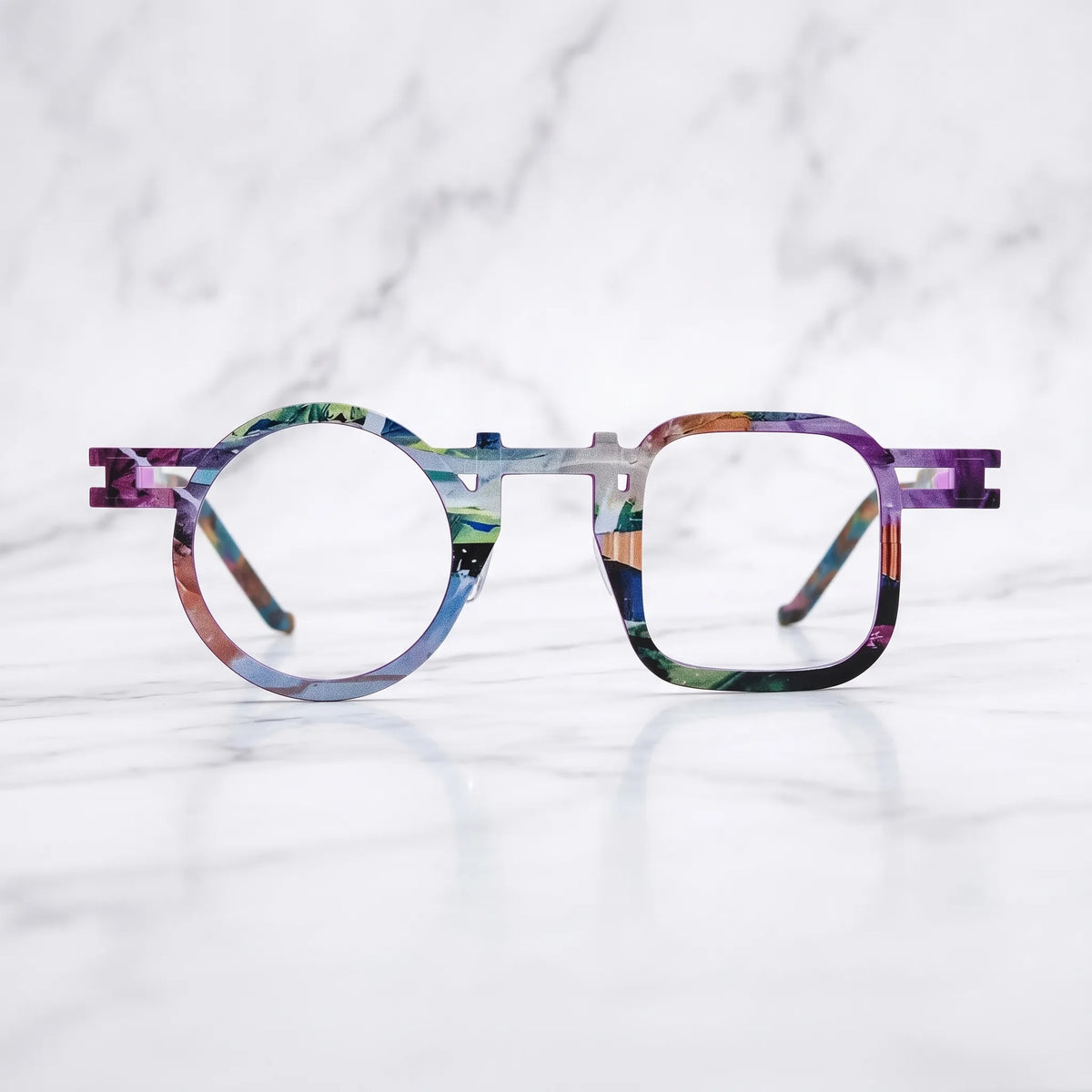 Barledear Prism Violet eyeglasses shown in a clean lifestyle front view with artistic geometric frame detail