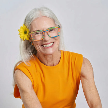 Model wearing Barledear Rainbow Horizon colorful square acetate eyeglasses in a modern lifestyle portrait