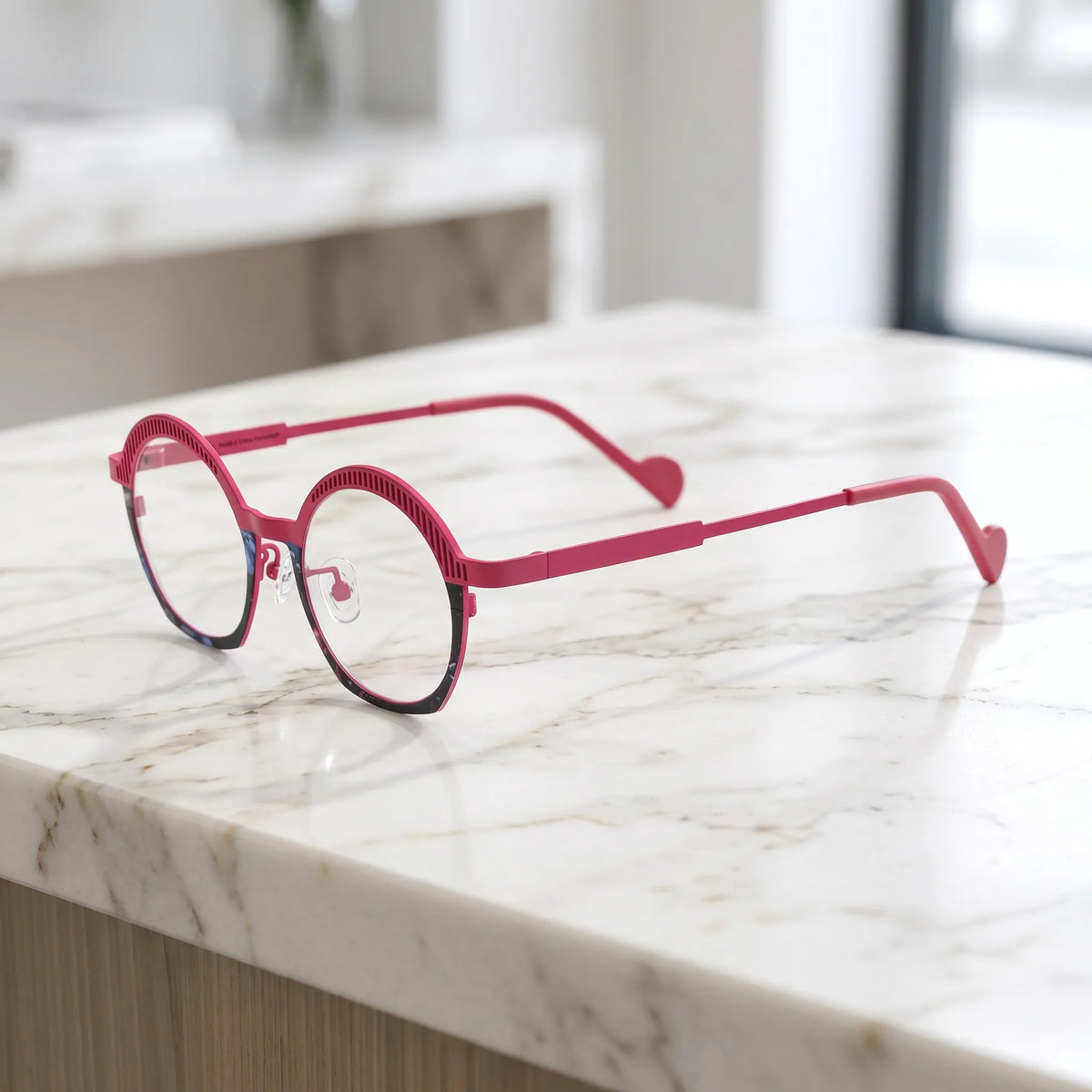Barledear Rose Mosaic eyeglasses angled side view showing slim titanium temples, geometric oval frame shape, and decorative browline detail