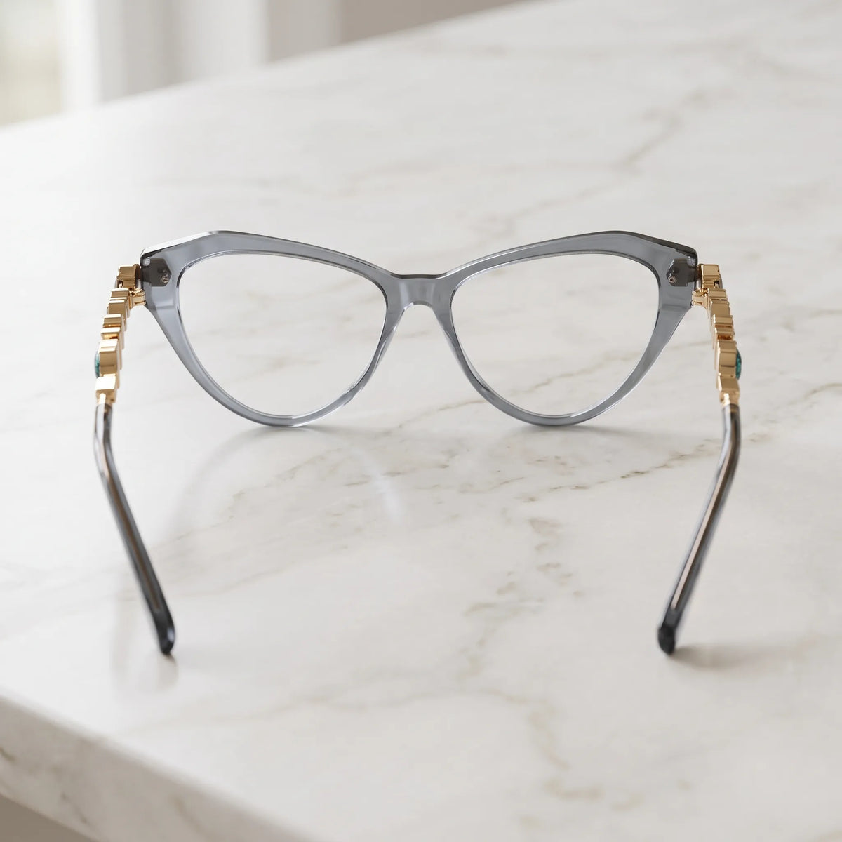 Barledear Smoke Quartz eyeglasses back view showing the full-rim cat-eye structure, molded nose pads, and smoky acetate temple tips