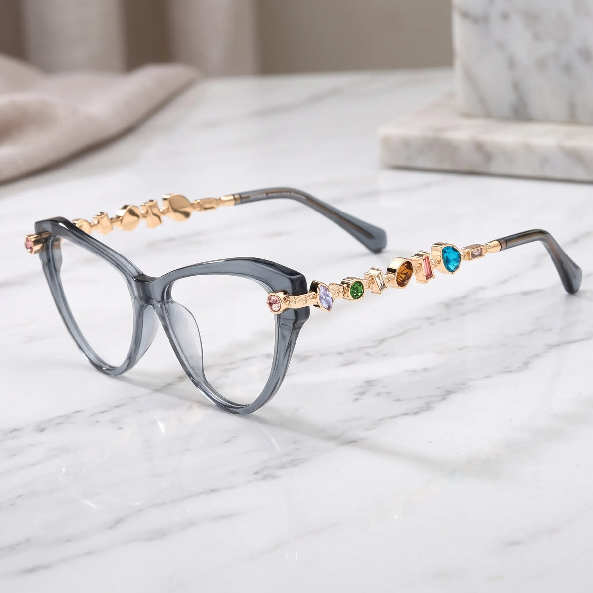 Barledear Smoke Quartz eyeglasses angled side view highlighting multicolor geometric crystal accents along the gold-tone temples