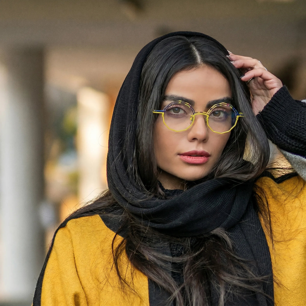 Model wearing Barledear Sunlit Cobalt eyeglasses in a lifestyle portrait