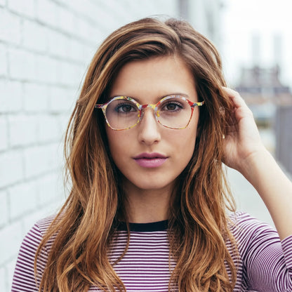 Model wearing Barledear Sunlit Mosaic Yellow eyeglasses in a lifestyle portrait