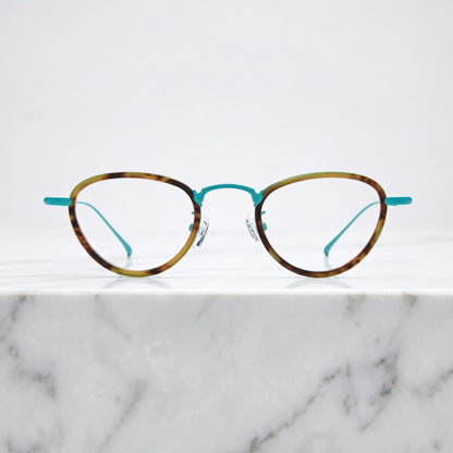 Barledear Sunlit Teal Tortoise eyeglasses shown in a clean lifestyle front view with teal titanium details