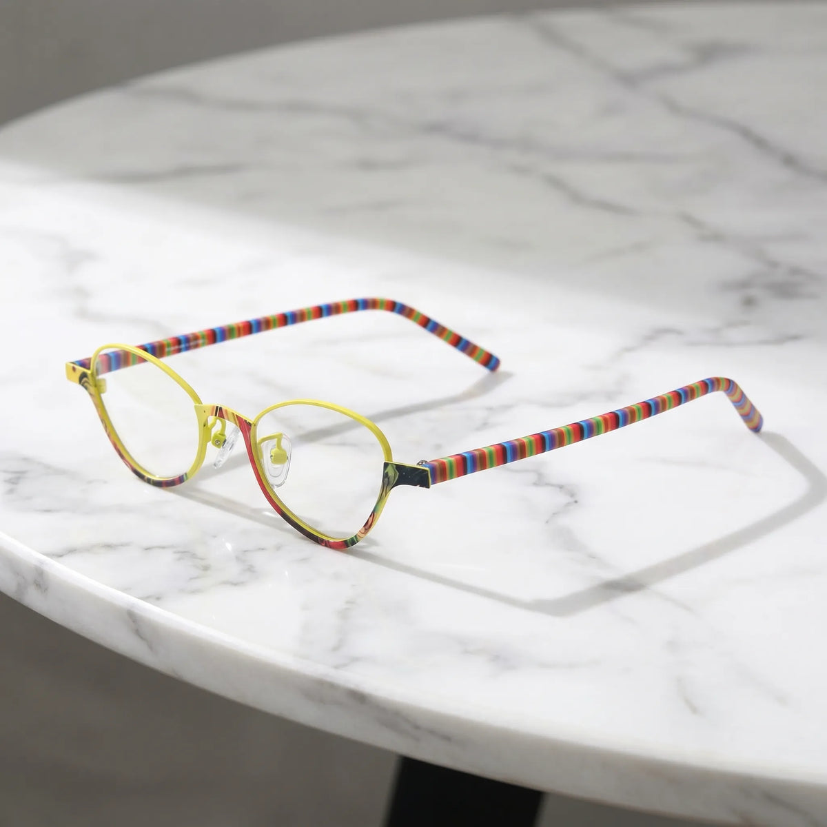 Barledear Sunshine Mosaic eyeglasses angled side view showing rainbow-patterned temples nose pads and bridge detail