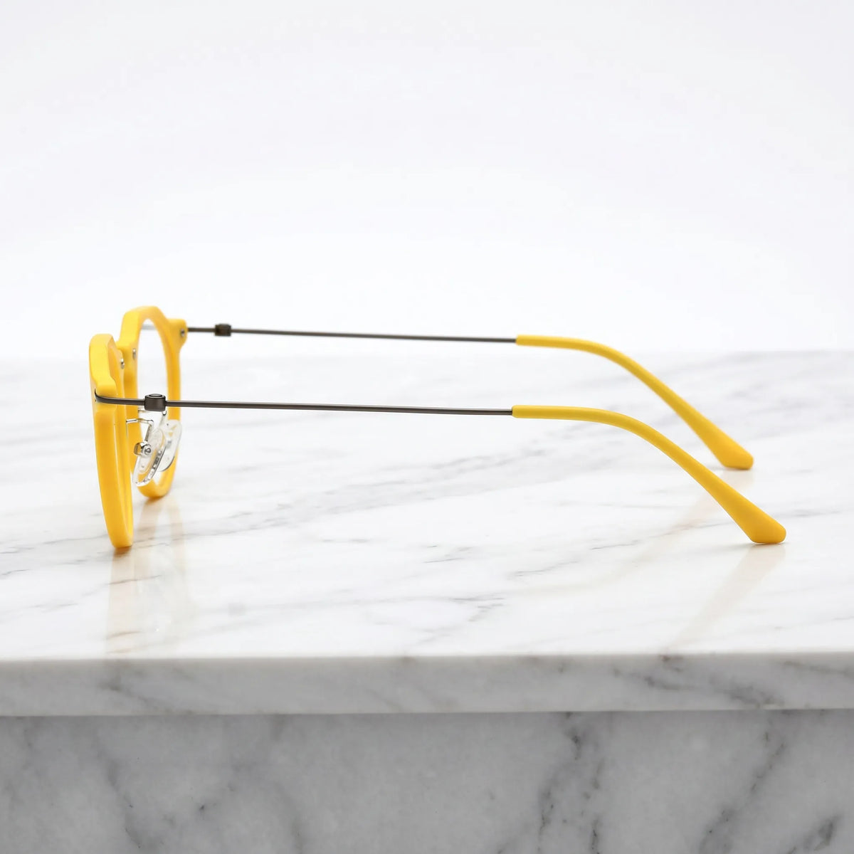 Barledear Sunshine Yellow eyeglasses angled side view showing slim wire temples adjustable nose pads and bridge detail