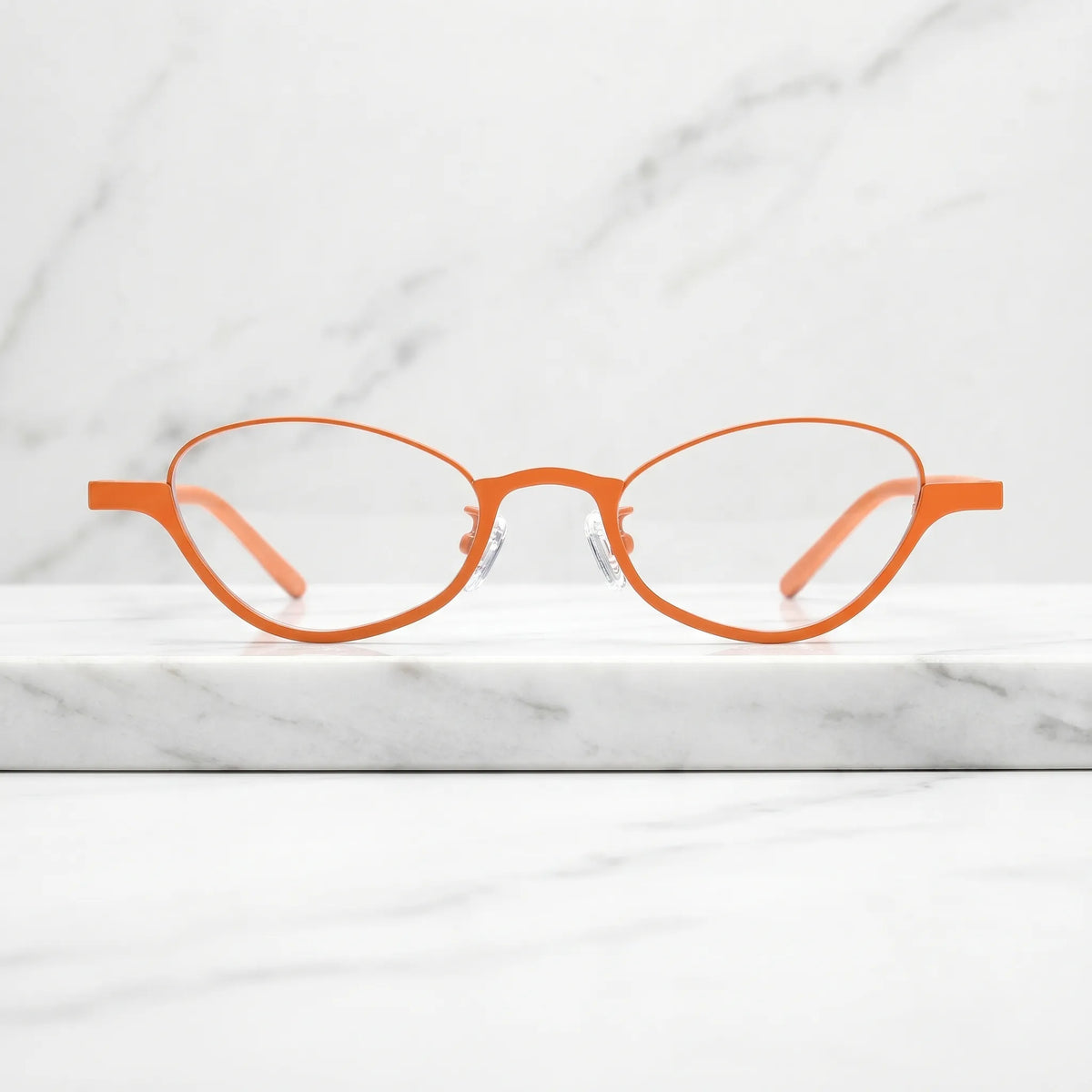 Barledear Tangerine Bloom eyeglasses shown in a clean lifestyle front view with warm orange oval frame