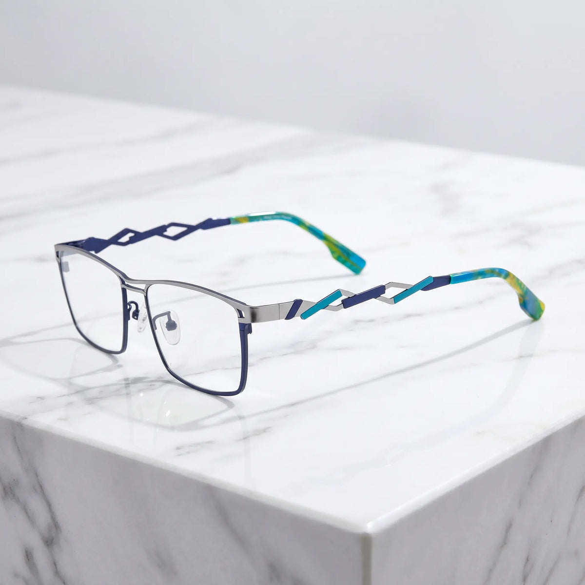 Barledear Titan Sky Blue eyeglasses angled side view showing futuristic geometric cutout temples and slim bridge detail