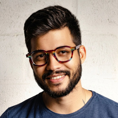 model wearing Barledear Violet Prism eyeglasses in a lifestyle portrait with retro square acetate frame