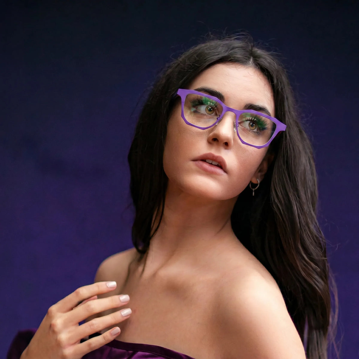 Model wearing Barledear Violet Shadow eyeglasses with expressive purple square titanium frame in a lifestyle portrait