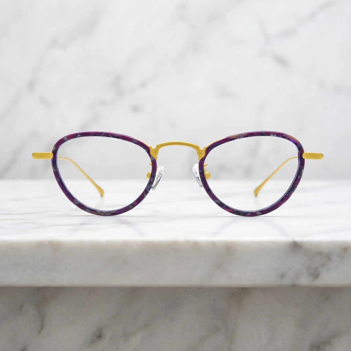 Barledear Violet Sunshine eyeglasses shown in a clean lifestyle front view with violet patterned acetate and yellow titanium details