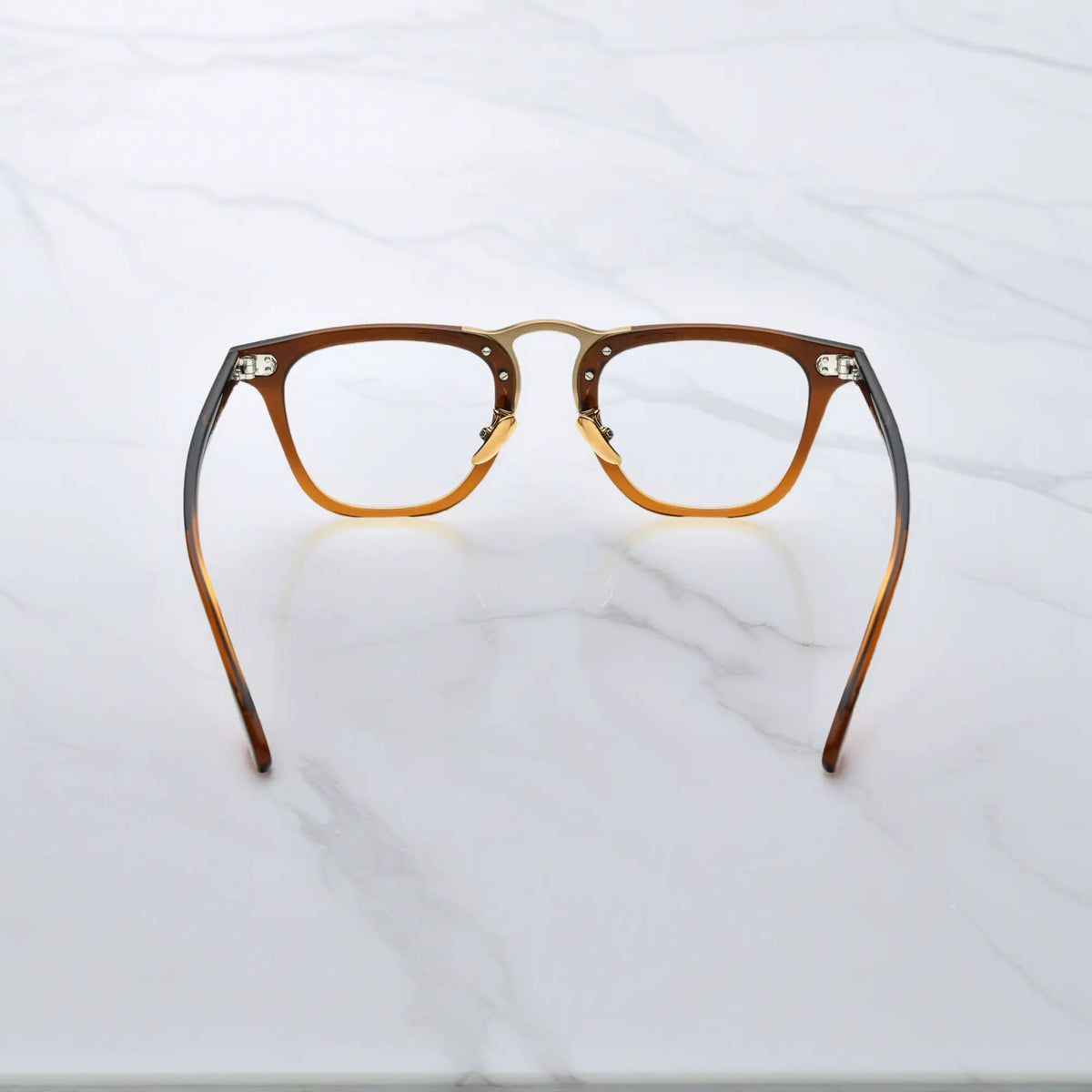 Rear view of VoyueLens VL19214 brown square acetate glasses, showing temple curvature and inner surface craftsmanship.