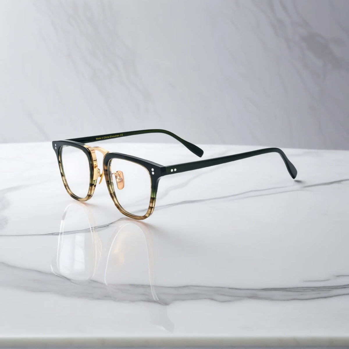 Side profile of VoyueLens VL19214 gold striped square glasses featuring polished temples and premium hinge structure.